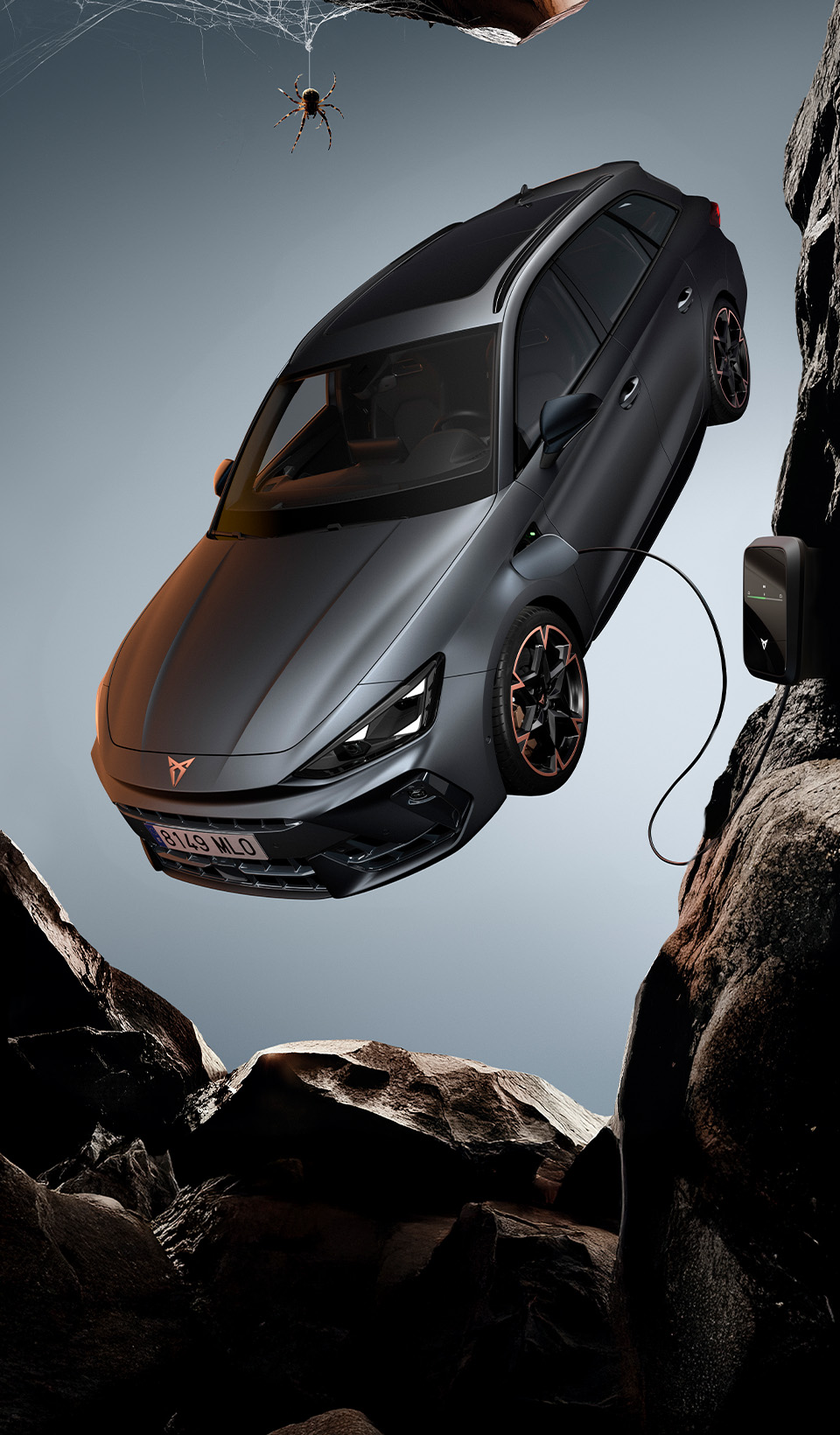 A CUPRA Leon Sportstourer shown from an elevated angle, with a person draped in dark, flowing fabric that creates a dynamic, red-lit trail beside the car. A CUPRA Leon Sportstourer shown from an elevated angle, with a person draped in dark, flowing fabric that creates a dynamic, red-lit trail beside the car.